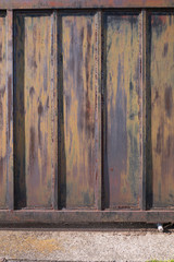 A rusty iron gate