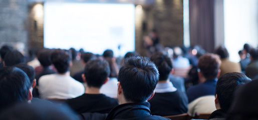 Audience Listens to Lecturer at a Conference Meeting Seminar Training. Group of People Hear...