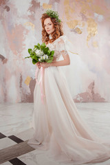 Elegant red-haired girl bride. Young beautiful woman in wedding dress