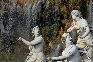 Reggia di Caserta, Italy. White marble sculptures under water cascade
