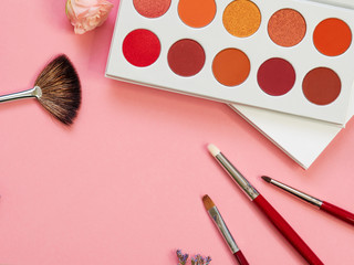 Set for eye makeup, eyeshadow in a palette and brush for a good application