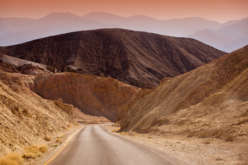 Fototapeta na wymiar Scenic road in the desert of Death valley national park, USA