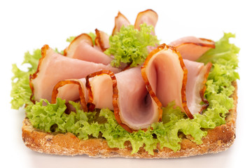 Sandwich with ham sausage on white background.