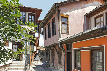 Fototapeta na wymiar Typical cobblestones street in old town of city of Plovdiv, Bulgaria