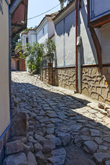 Typical cobblestones street in old town of city of Plovdiv, Bulgaria