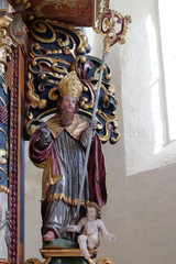 St. Augustine of Hippo statue on the main altar in the chapel of St. Wolfgang in Vukovoj, Croatia