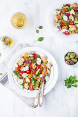 Italian traditional salad panzanella with fresh tomatoes and bread