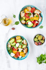 Italian traditional salad panzanella with fresh tomatoes and bread