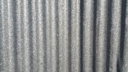 Silver corrugated metal sheet texture background