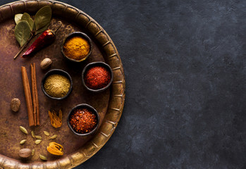 Spices seasoning in bowls and copy space for text. Spicy banner
