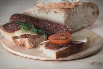 Sandwiches with salami and cheese
