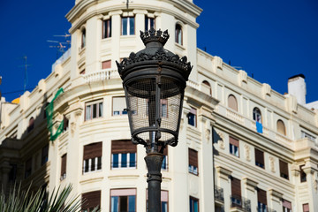 Fototapeta na wymiar Old street lamp at Town Hall Square (Plaza del Ayuntamiento). Valencia, España