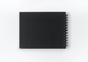 black notebook on white background with clipping path