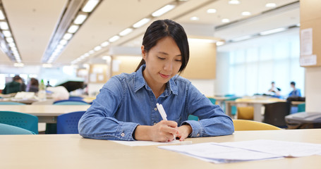 Woman study at library