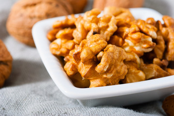 hard shell stone fruits on white wood table background