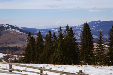 Spring vs winter landscape in the Carpathian mountains  