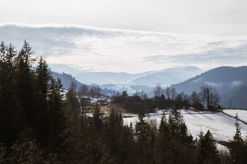 Spring vs winter landscape in the Carpathian mountains  