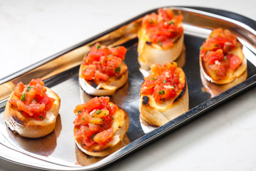 roasted baguette with tomatoes and basil