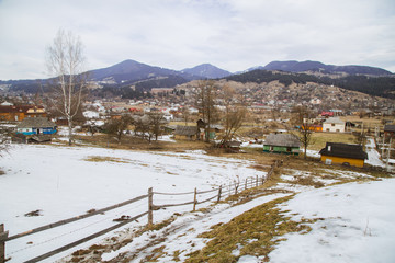 Spring vs winter landscape in the Carpathian mountains