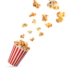 Carton cup with delicious fresh popcorn on white background