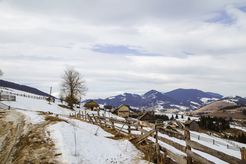 Spring vs winter landscape in the Carpathian mountains