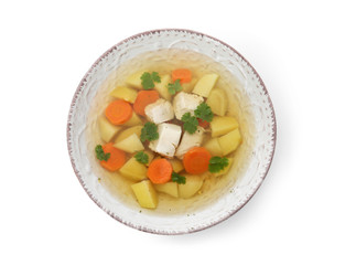 Dish with fresh homemade chicken soup on white background, top view