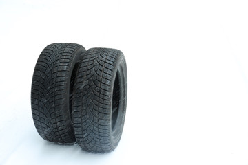 New winter tires on fresh snow. Space for text