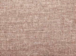 Textured beige natural fabric . 
