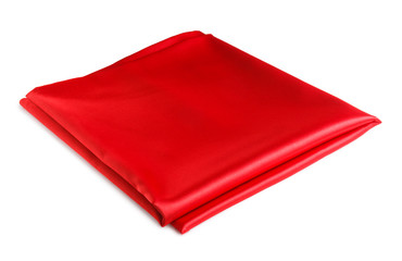 folded piece of bright red satin fabric isolated on white background