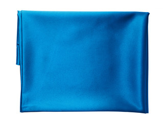 folded piece of bright blue satin fabric isolated on white background, top view
