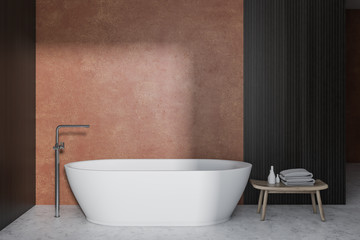 Beige bathroom interior, tub and chair