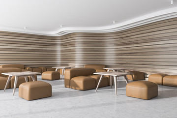 Wooden office waiting room with tables