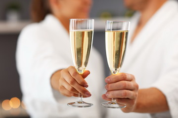 Adult happy couple relaxing in spa salon