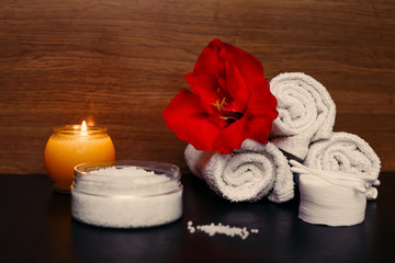 Fototapeta na wymiar spa setting with candles and towel