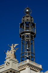 Fototapeta na wymiar Post and telegraph building tower (Oficina de Correos) near Town Hall Square. Valencia, Spain