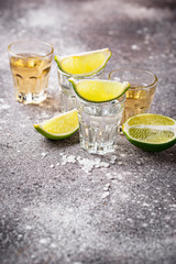 Shots of silver and gold tequila