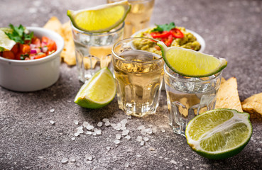 Shots of silver and gold tequila