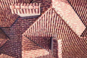 Obraz na płótnie Canvas Top aerial view of building complex shingle roof construction. Abstract background.