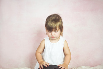Fototapeta premium Sad blonde little girl