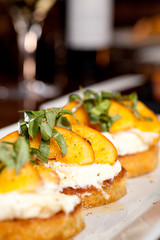 Grilled Peaches with Ricotta Cheese and Basil bruschetta