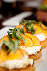 Grilled Peaches with Ricotta Cheese and Basil bruschetta