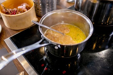 Broth is cooked in a pan. Master class in the kitchen. The process of cooking. Step by step. Tutorial. Close-up