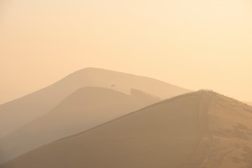 Stunning Winter sunrise landscape image of The Great Ridge in the Peak District in England with a...