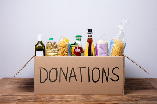 Various Foods In A Donation Cardboard Box
