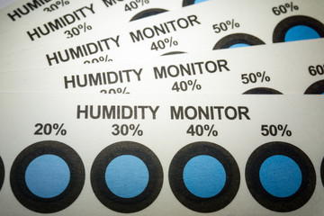 Close-up of humidity indicator cards from electronics manufacturing industry with blue indicator dots