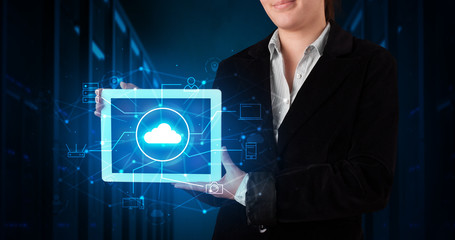 Formal hand in server room with virtual workspace concept
