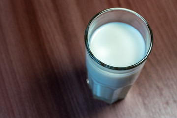 Glass with milk on the table. Useful natural product.