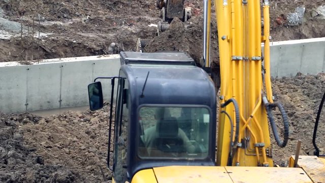 Drilling machine which is preparing to form a hole in the soil.