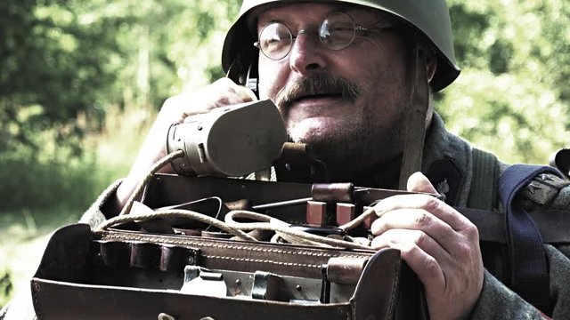 Soldier talks with his radio