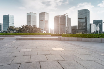 Urban skyscrapers with empty square floor tiles